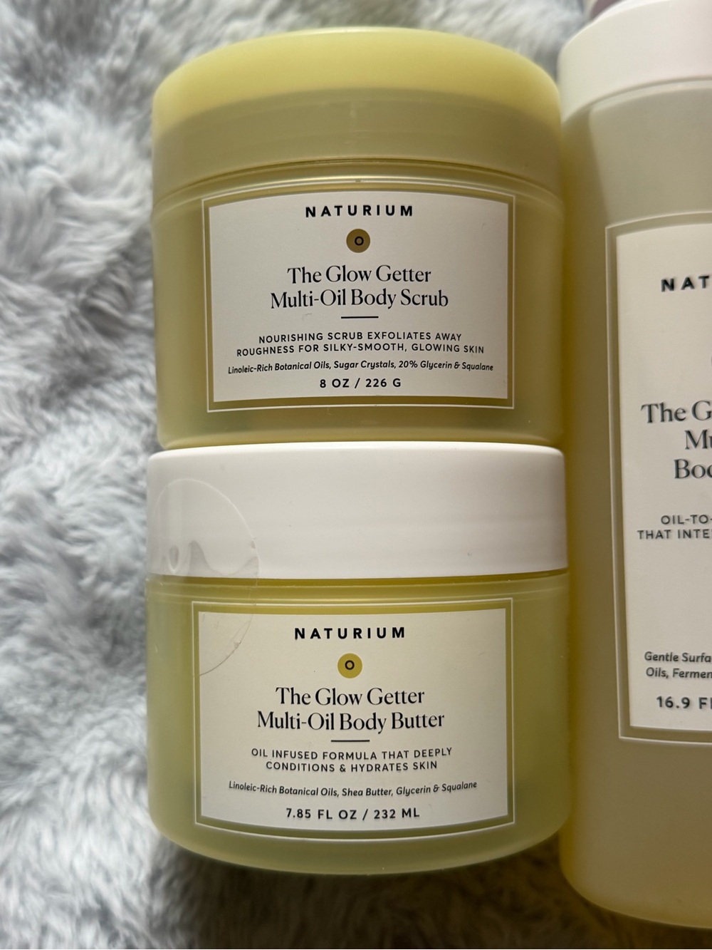 Naturium The Glow Getter Multi-Oil Body Wash, Body Butter, and Scrub - Picture 2 of 3